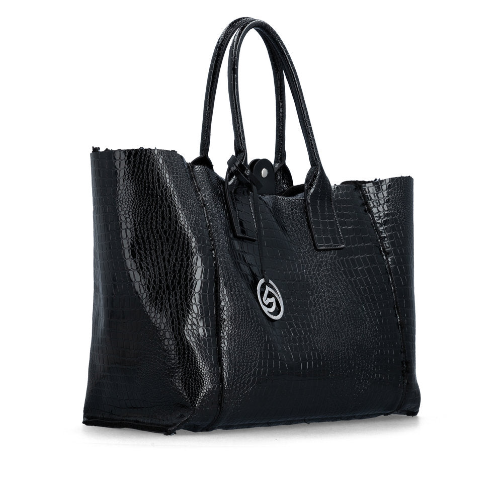A black textured tote bag with a crocodile-embossed pattern, dual top handles, and a silver-tone circular logo medallion on the front, shown against a plain white background.
